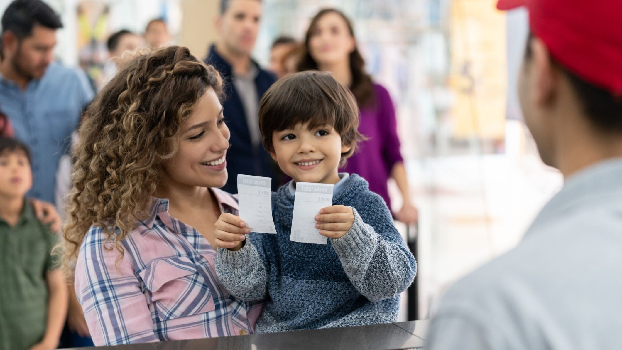 Mom and son with tickets